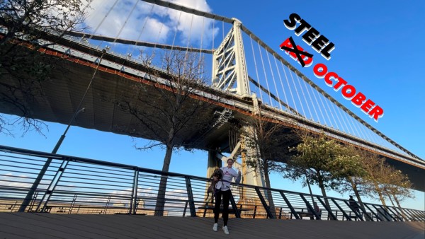 Jessalyn Wright in front of a lovely steel bridge